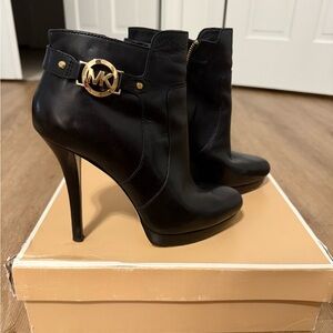 Michael Kors Black Wyatt Bootie with Gold Accent